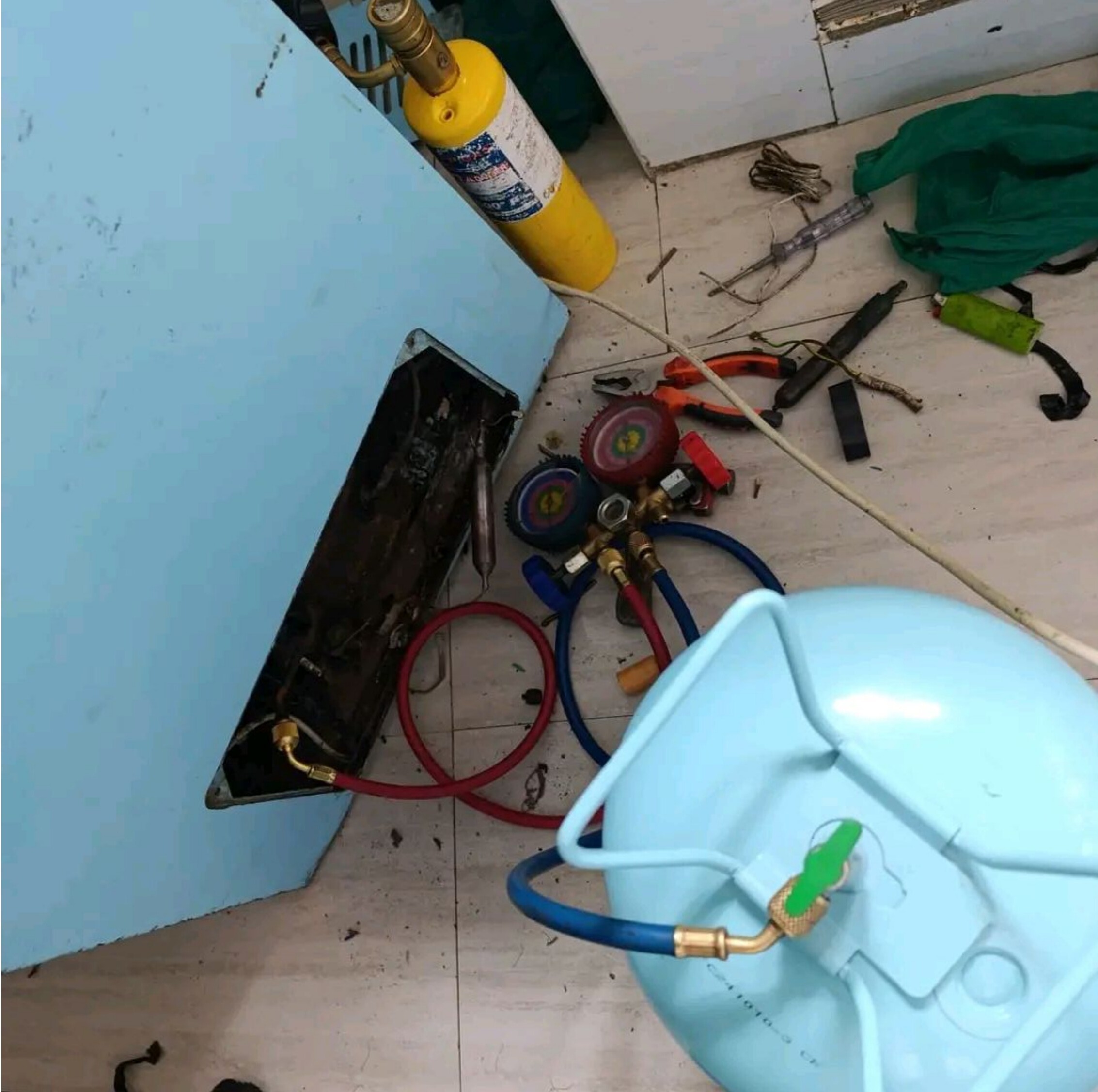 AC unit panel removed for component repair
