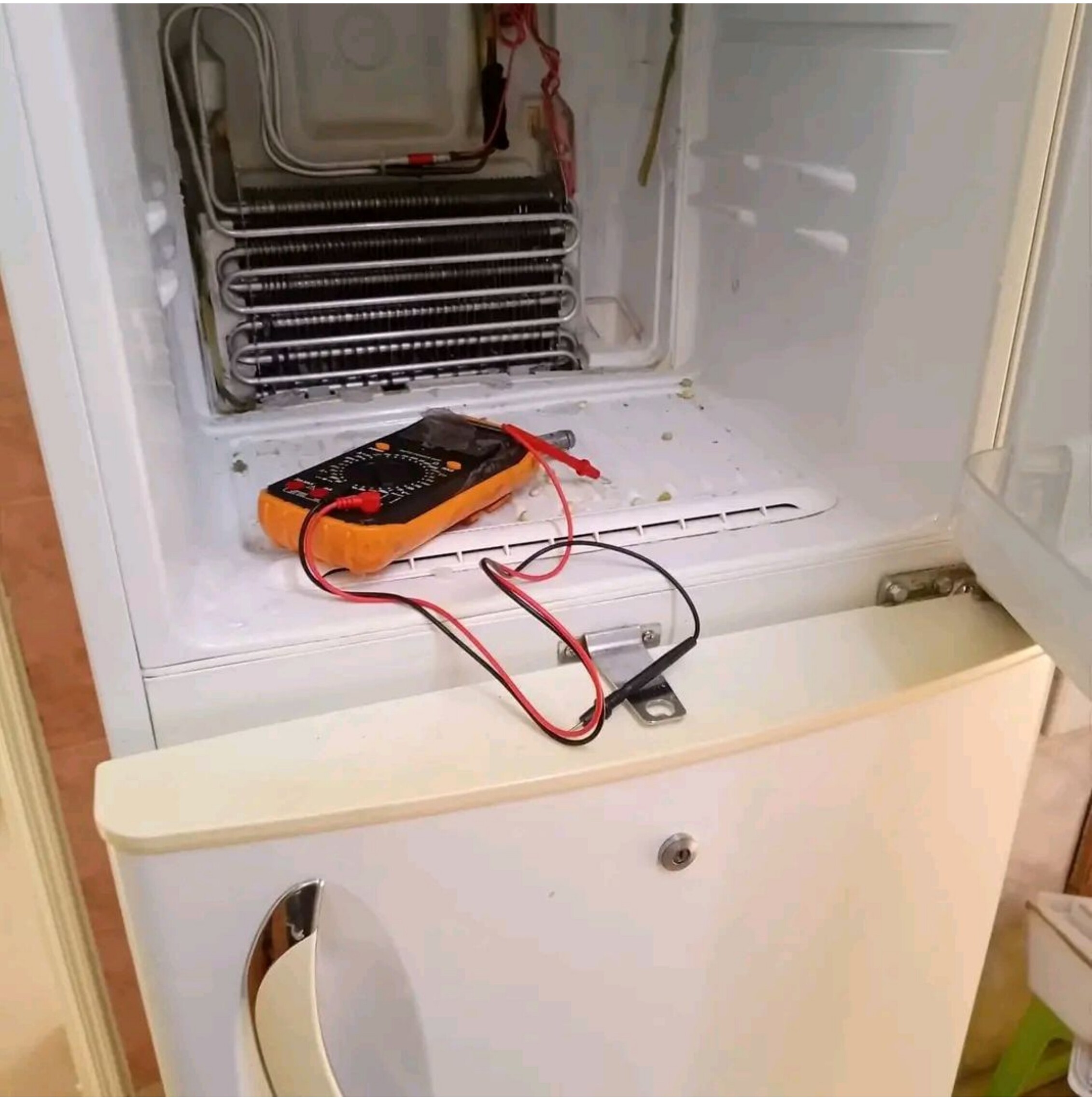 Freezer cooling coils — multimeter test