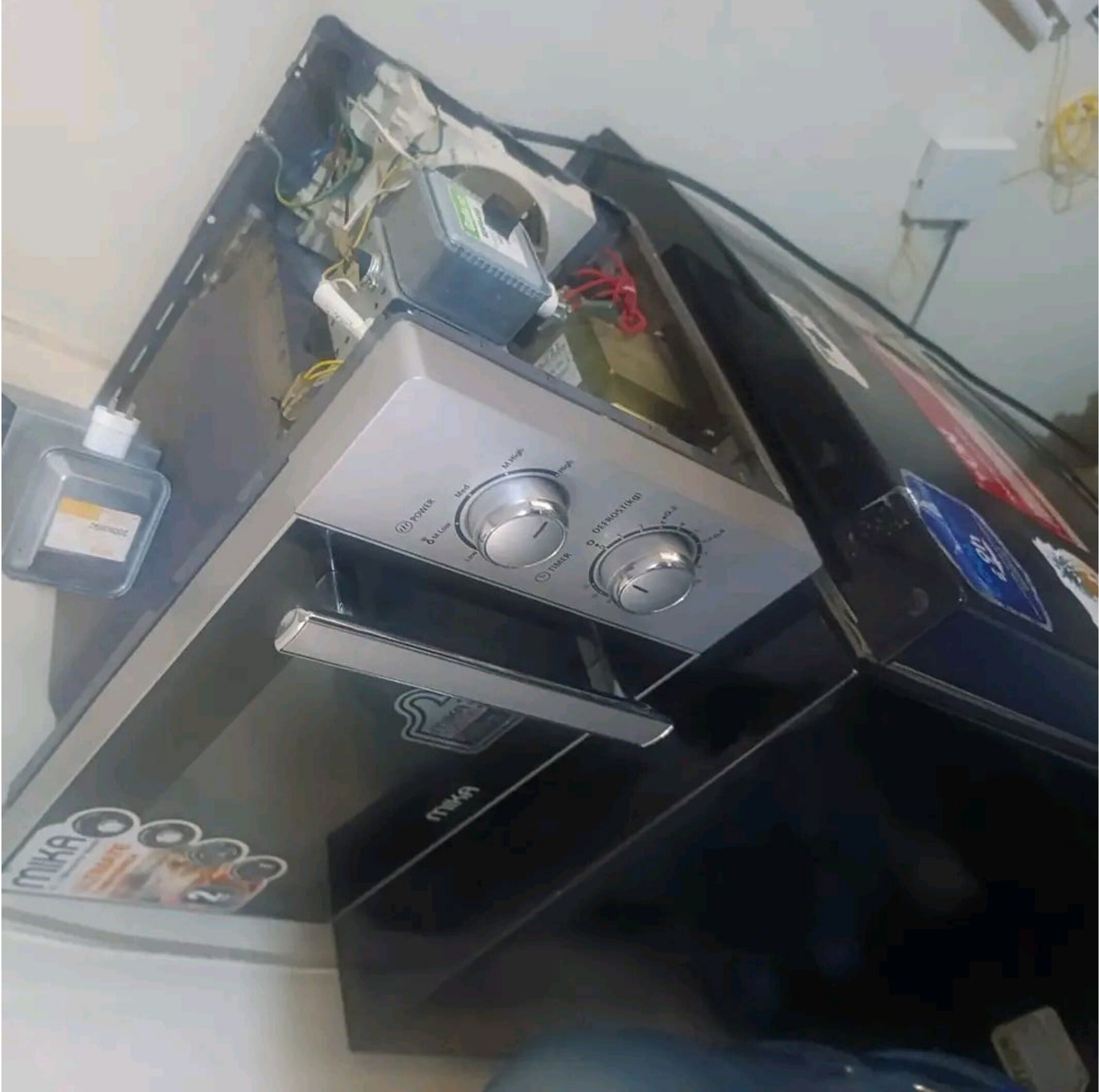Microwave top casing removed for repair